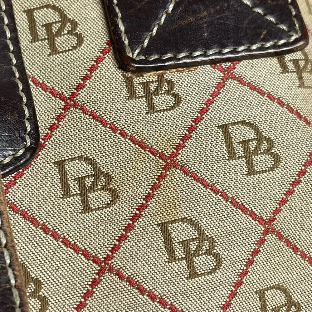 Dooney & Bourke accents buckle